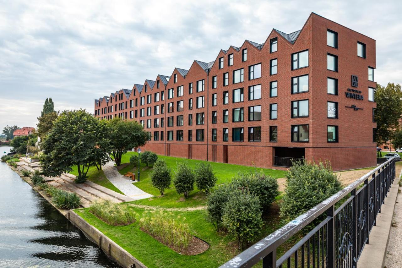 Pobookowane River View Apartments Гданьск Экстерьер фото